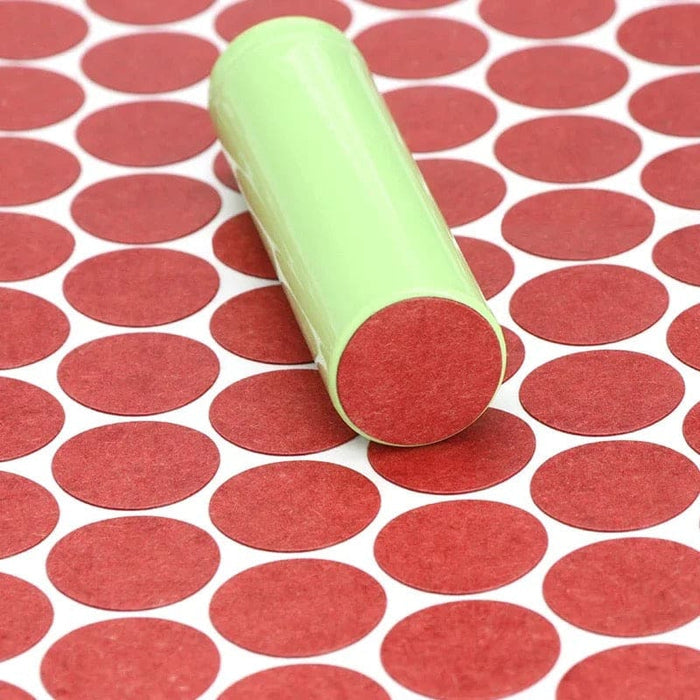 Set of 50 red and white polka 18650 battery terminal gaskets for battery insulation and protection.