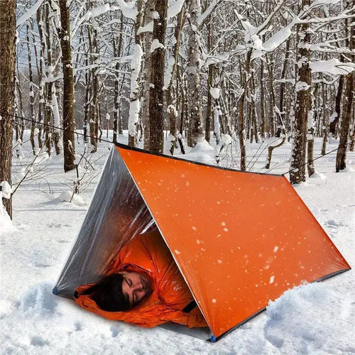 Orange Habicare 2-person emergency shelter made of lightweight SS material, designed for quick shelter in outdoor emergencies.