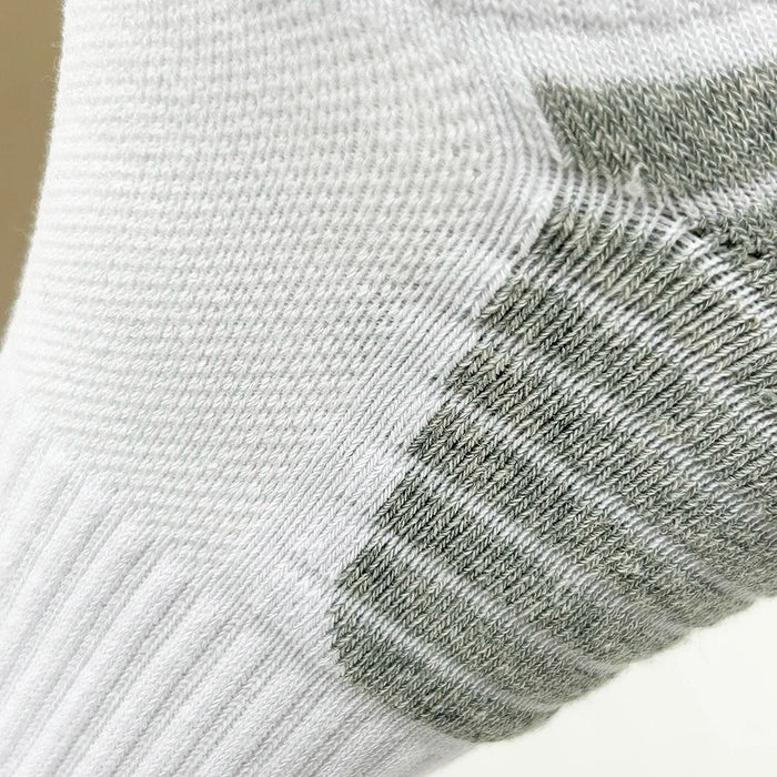 Pair of Habicare cushioned cotton ankle socks, low-cut athletic sports socks for men and women, perfect for active wear.