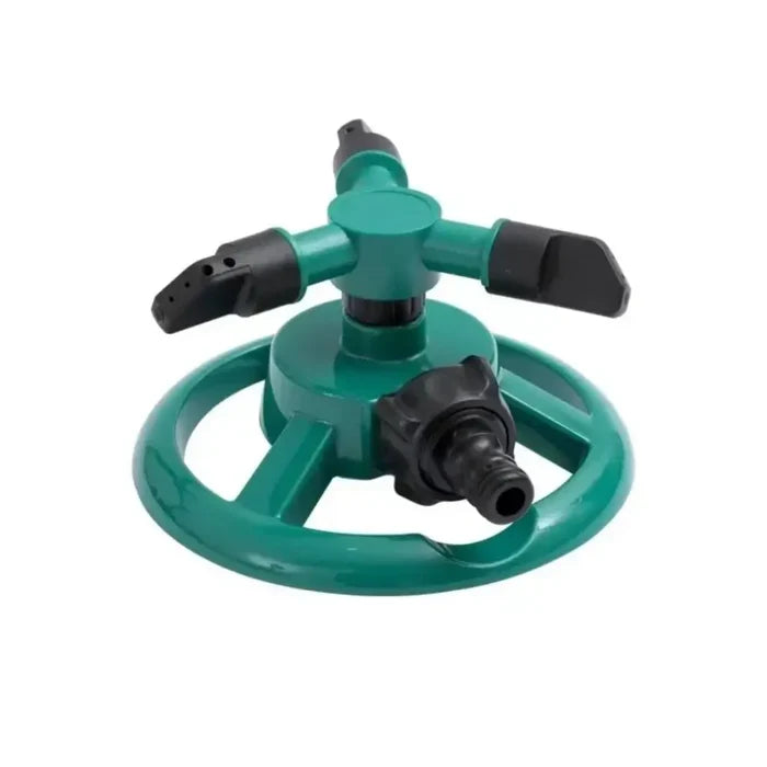 Green Habicare SS 360° automatic rotating sprinkler watering lawn with even coverage and adjustable rotation.