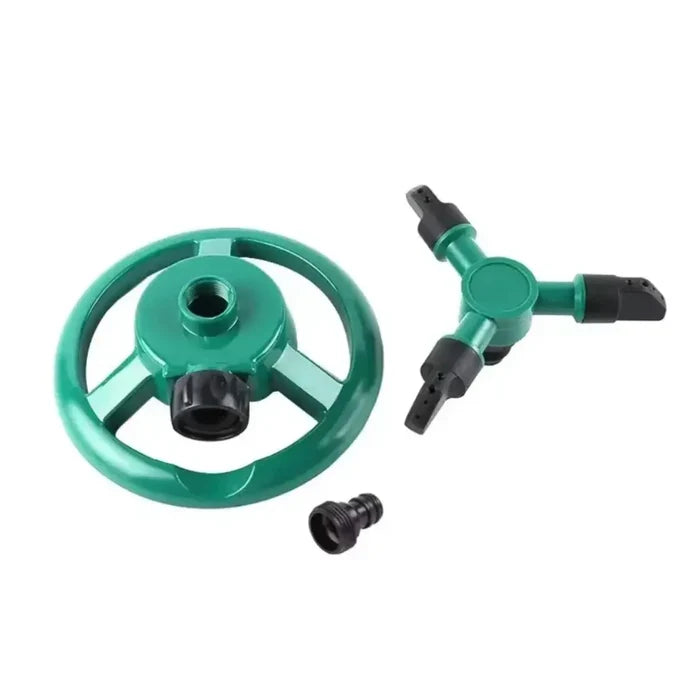 Green Habicare 360° Automatic Rotating Sprinkler, SS model, showing the sprinkler in action with rotating arms for even water coverage
