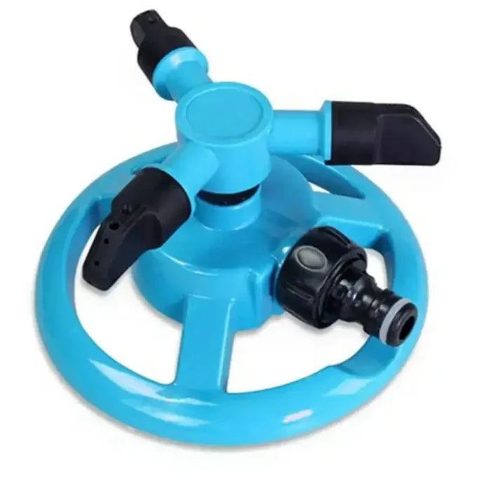 Green Habicare 360° automatic rotating sprinkler with stainless steel components, designed for even watering coverage.