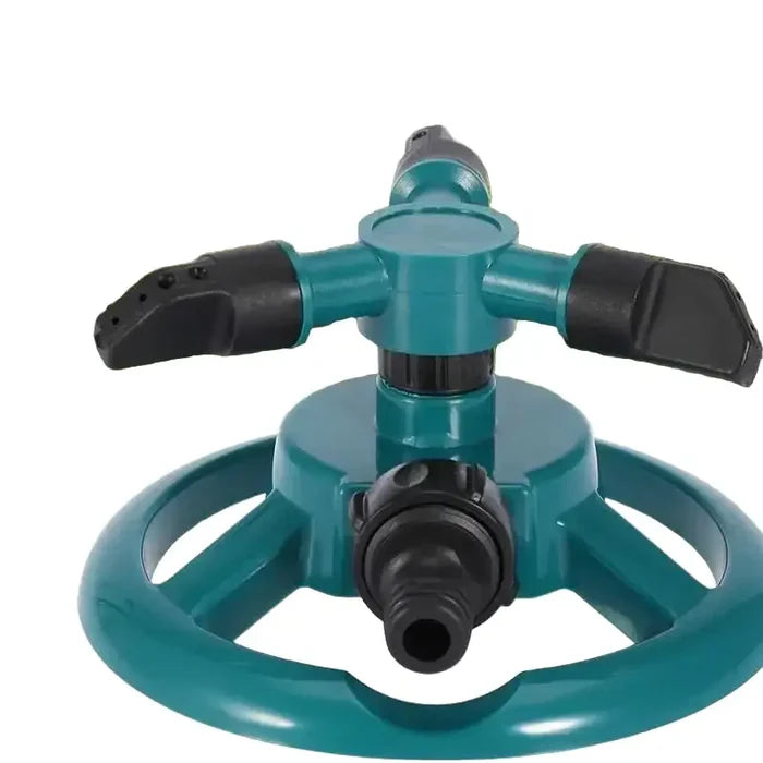 Green Habicare 360° automatic rotating sprinkler with stainless steel body, ideal for even garden watering.