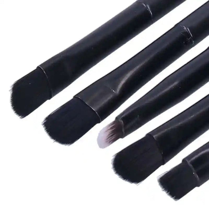 Set of five watch cleaning brushes from That Watch Shop, including small tools for precise watch maintenance and cleaning.