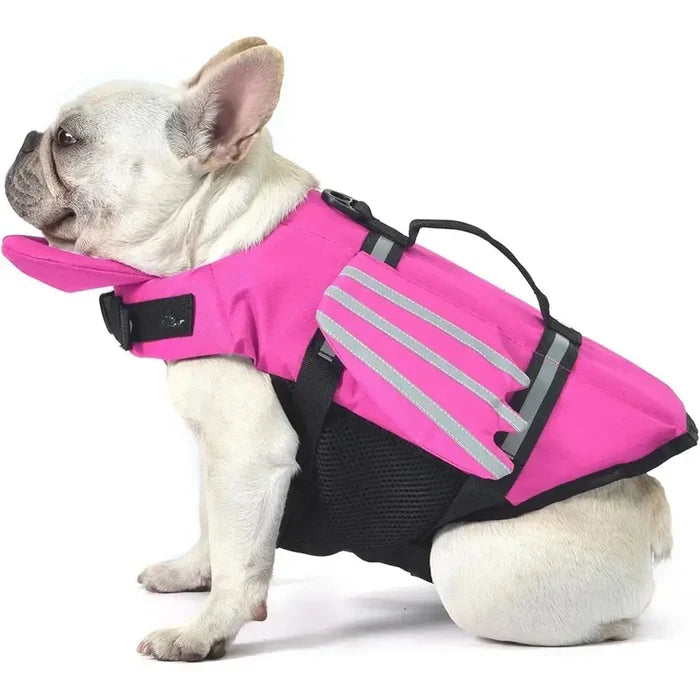 Pink adjustable dog life jacket with chin float and rescue handle, designed for safety and comfort during water activities.