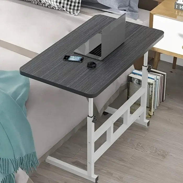 Habicare SS adjustable height desk showing a lightweight, portable design with a sleek surface and ergonomic features.