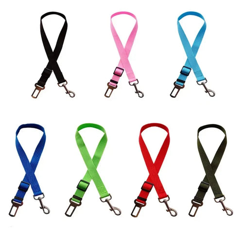 Habicare adjustable vehicle harness for dogs in various colors, featuring secure straps and a comfortable fit for car travel.