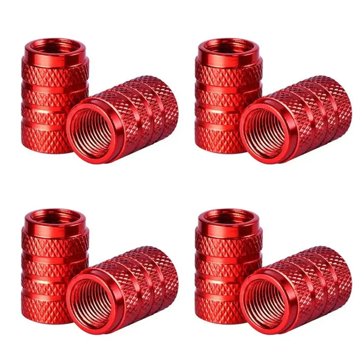 Set of four Habicare aluminium tire valve stem caps in various colors for car wheels.