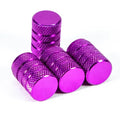 Set of four Habicare Aluminium Tire Valve Stem Caps in various colors, durable metal caps for vehicle tire valves.