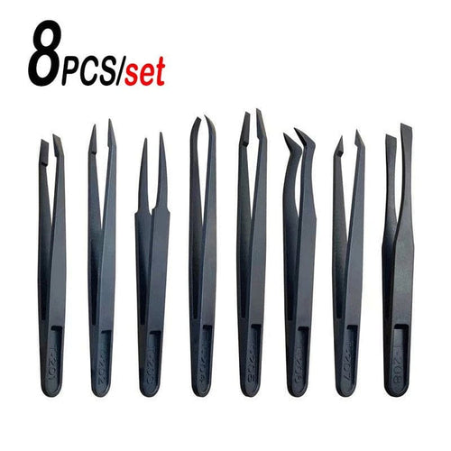 Set of eight anti-static plastic watch repair tweezers from That Watch Shop, designed for delicate watch component handling.