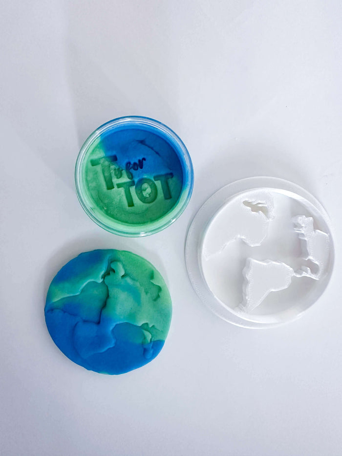 Play and learn Around the World kit for children. Comes with 'Around the World in 80 Days' board book, homemade playdough, 3D-printed Earth playdough cutter, travel-themed activities, and crafts from around the globe.