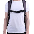 Black 9eight5 backpack chest strap attached to a backpack for secure, comfortable carry.