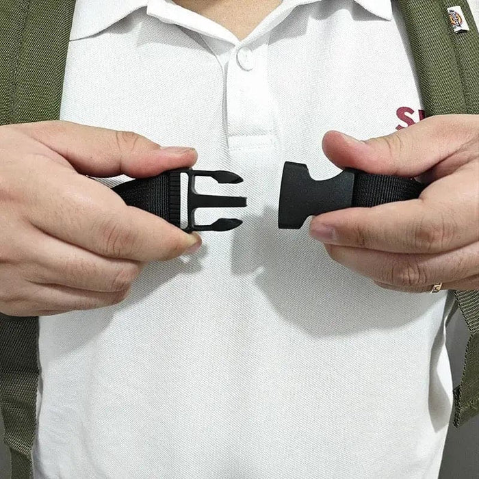 Black 9eight5 backpack chest strap attached to a backpack for added stability and comfort during outdoor activities.
