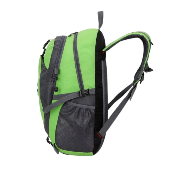Green and black 9eight5 backpack with adjustable straps and multiple compartments, ideal for school or travel.