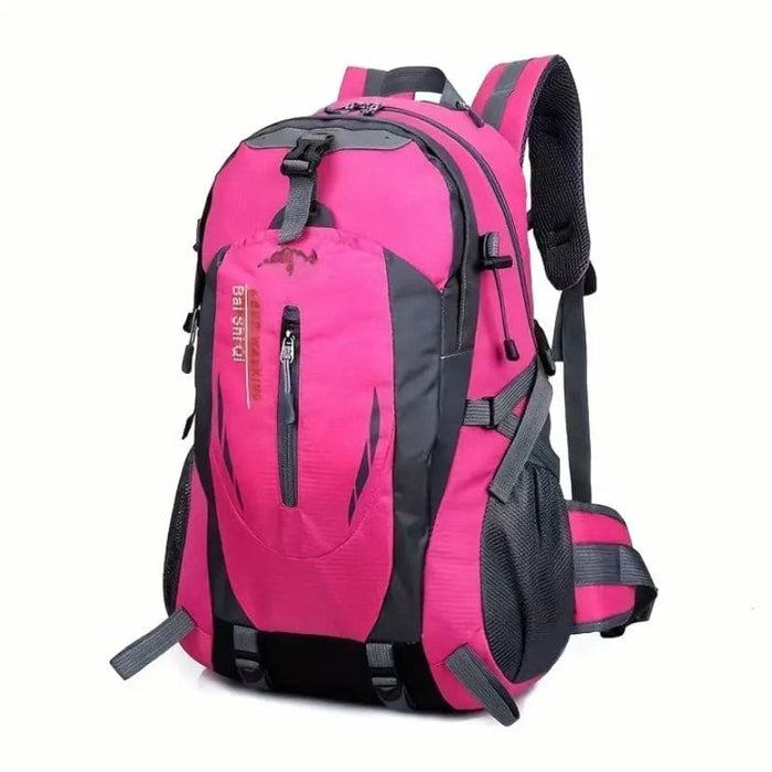 Pink 9eight5 backpack with adjustable straps and front pocket, showcasing a stylish and functional design.