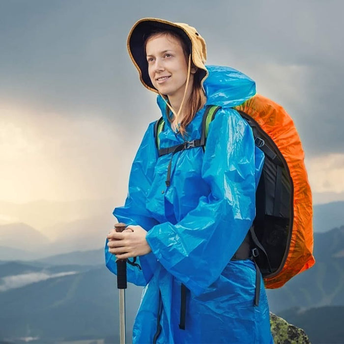 Orange waterproof backpack cover by 9eight5 protecting a backpack from rain and moisture.