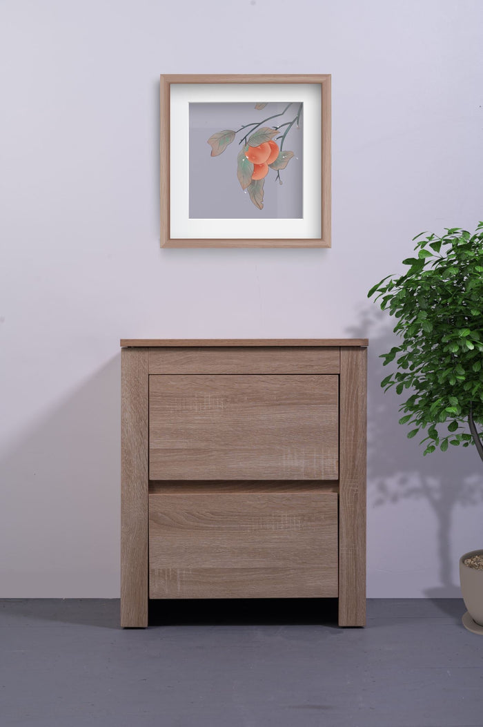 Light oak bedside table from Sue-E Furniture's Byron collection, featuring a sleek modern design with a single drawer.