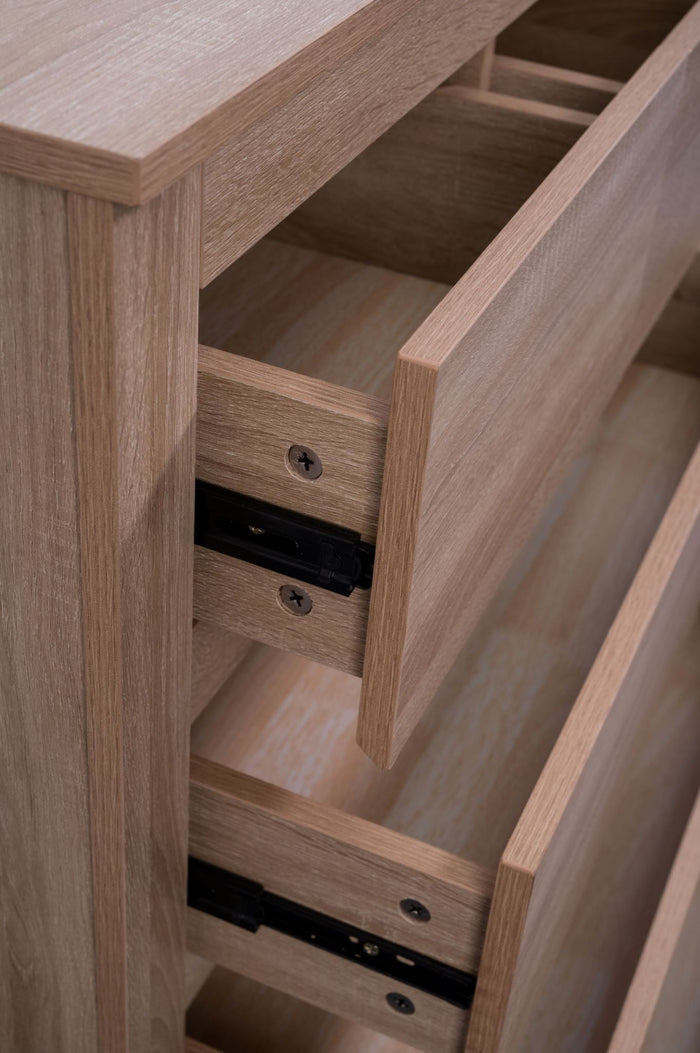 Tall boy dresser in light oak wood from Sue-E Furniture, featuring multiple drawers and a modern, sleek design.