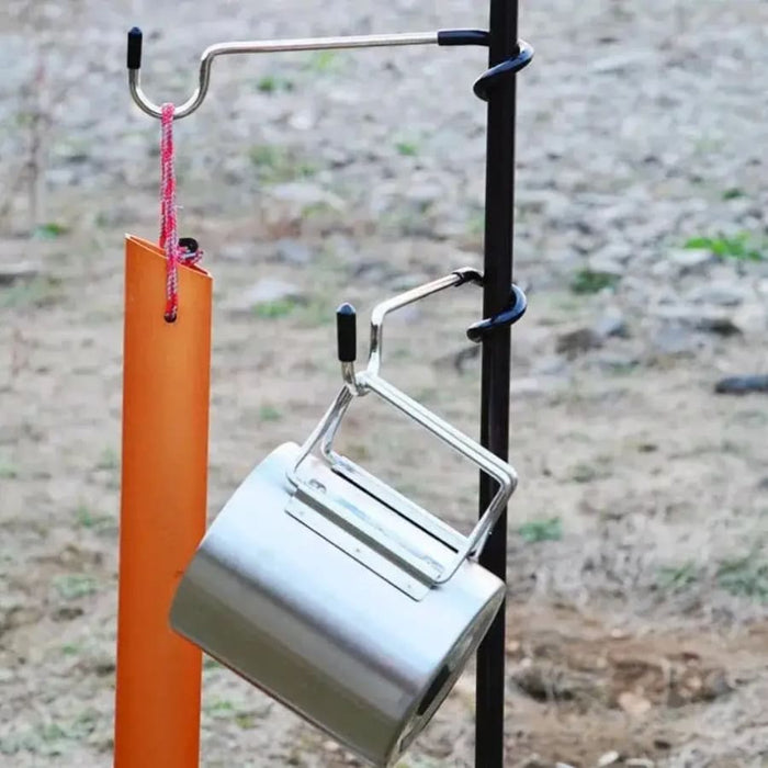 9eight5 camping multi-use hook attached to a tent or gear, versatile tool for hanging or securing camping equipment.