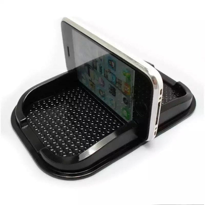 9eight5 car dashboard anti-slip phone holder securely grips devices on vehicle dashboards for safe, hands-free use.