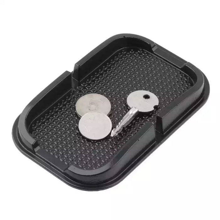 9eight5 car dashboard anti-slip phone holder securely grips smartphones on vehicle dashboards, providing stable hands-free use.