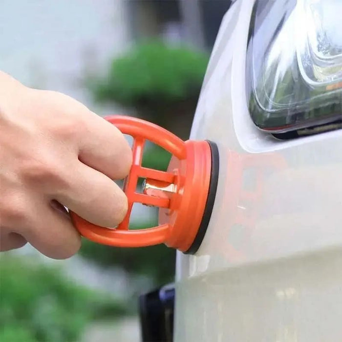 9eight5 car dent remover tool for repairing minor dents and dings on vehicle surfaces.