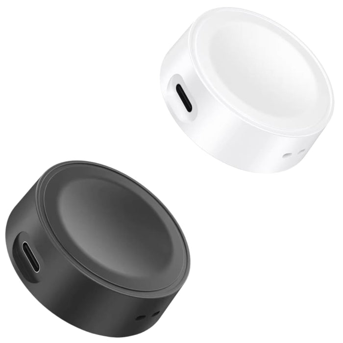 Black and white circular Samsung Galaxy Watch charger dock from That Watch Shop, designed for easy charging.