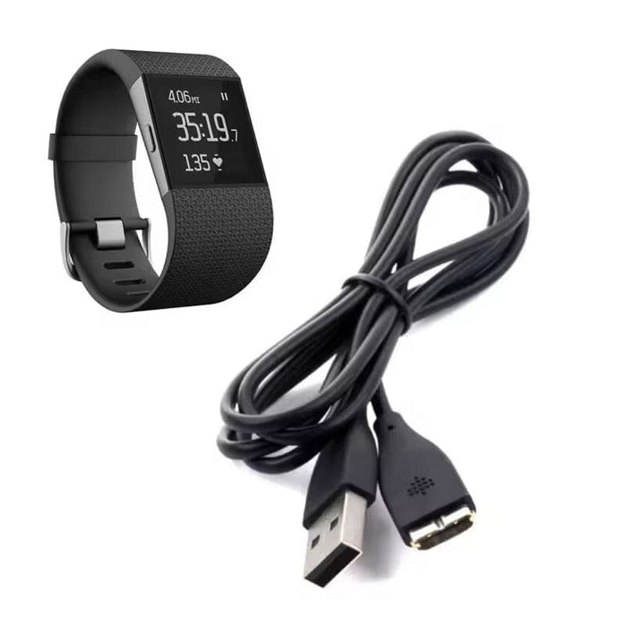 Black Fitbit Surge charger compatible with That Watch Shop, designed for easy and secure charging of Fitbit Surge devices.
