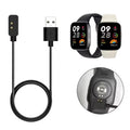 Black Redmi Watch 3 charger with USB-C cable designed for easy charging of Redmi Watch 3 devices.