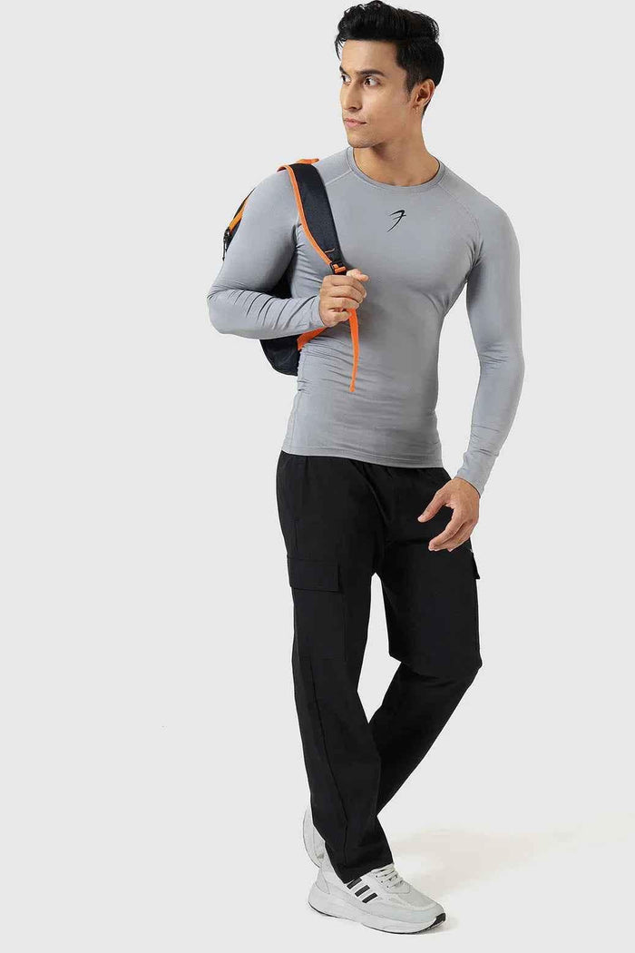 Fuaark Nz compression full sleeves T-shirt in Sea Grey, designed for support and comfort, shown on a plain background.
