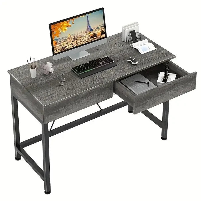 Habicare SS computer desk with drawers in grey, featuring a sleek design and ample storage, available in three colors.
