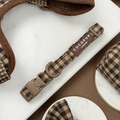 Brown and beige check pattern adjustable dog collar with metal buckle by Cocopup London.