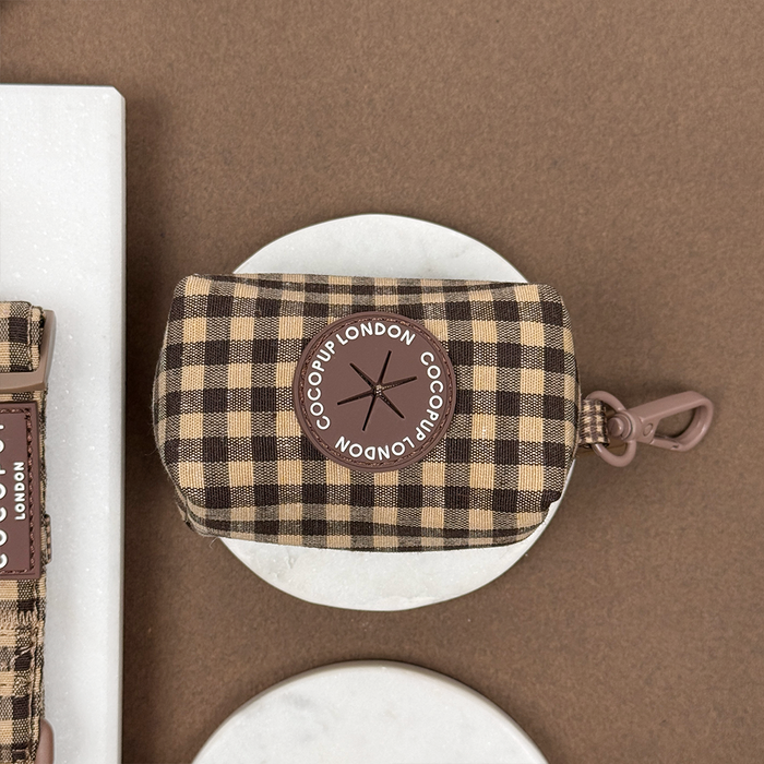 Cocopup London poop bag holder in Cotswold check pattern with gold zip and clip.