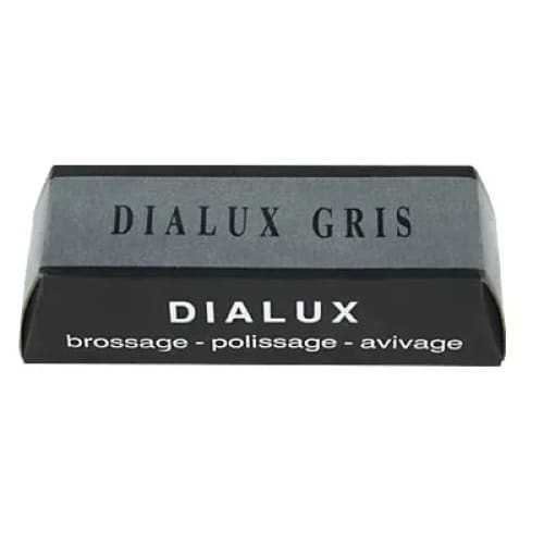 Dialux polishing compounds for watch tools, featuring small containers with polishing pastes for watch repair and finishing.