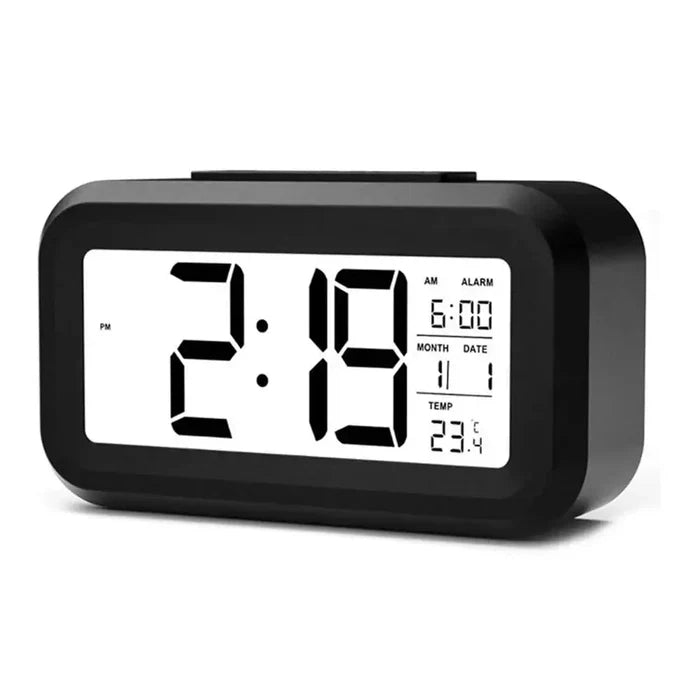 Habicare HBC digital alarm clock with battery operation, indoor temperature display, and backlight in three colors.