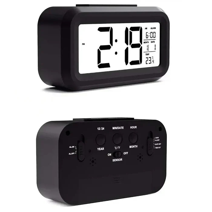 Habicare HBC digital alarm clock with battery power, indoor temperature display, light sensor, and adjustable backlight in three colors.