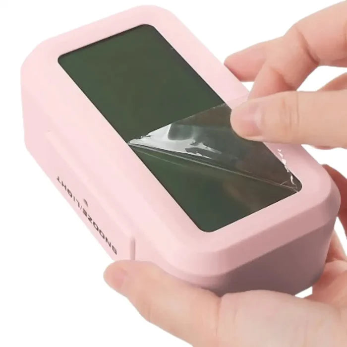 Habicare HBC digital alarm clock with battery power, indoor temperature display, and color-changing backlight in three options