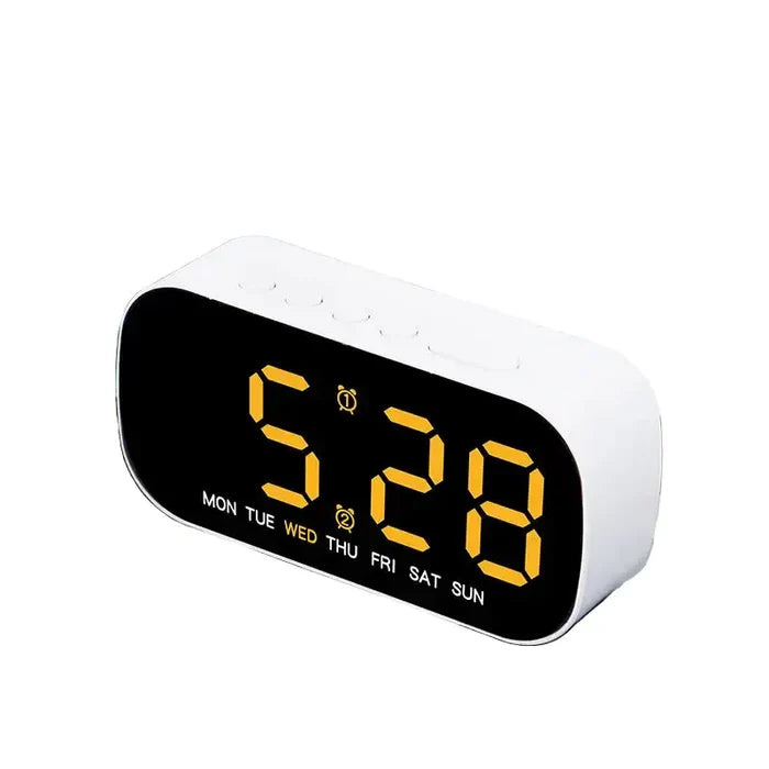 Habicare HBC digital alarm clock with USB-powered LED display in various colors, showing time and modern design.