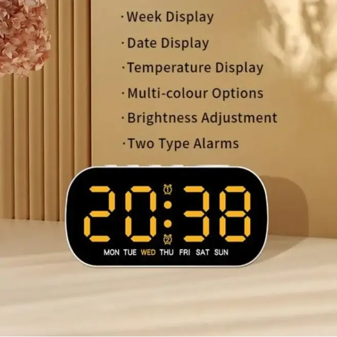 HBC Habicare digital alarm clock with USB-powered LED display in various colors, showing time on a sleek modern design.