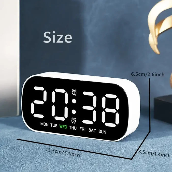 Habicare HBC digital alarm clock with USB-powered LED display in various colors, compact and modern bedside clock.