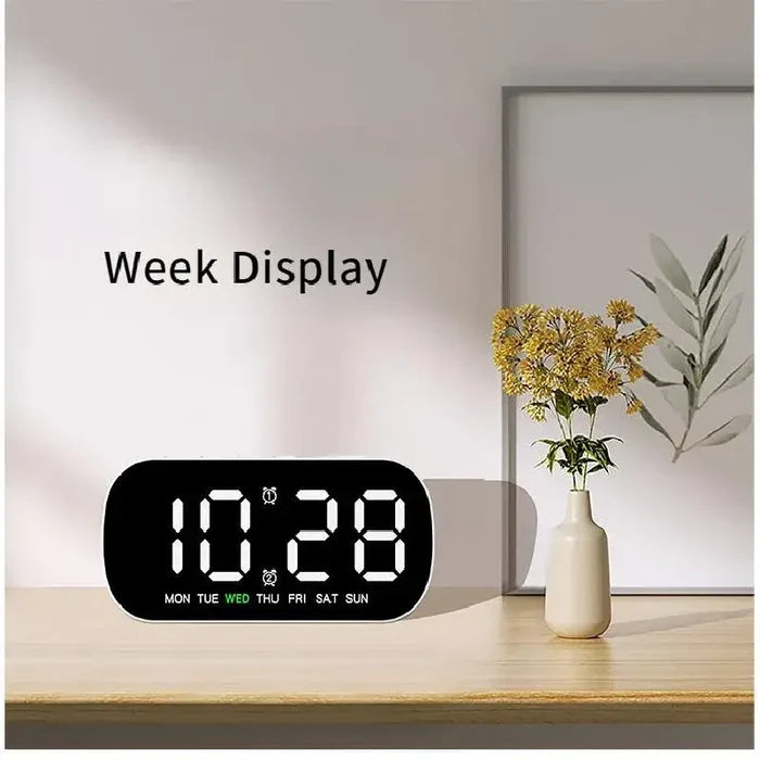 Habicare HBC digital alarm clock with USB-powered LED display in various colors, showing time on a sleek modern design.