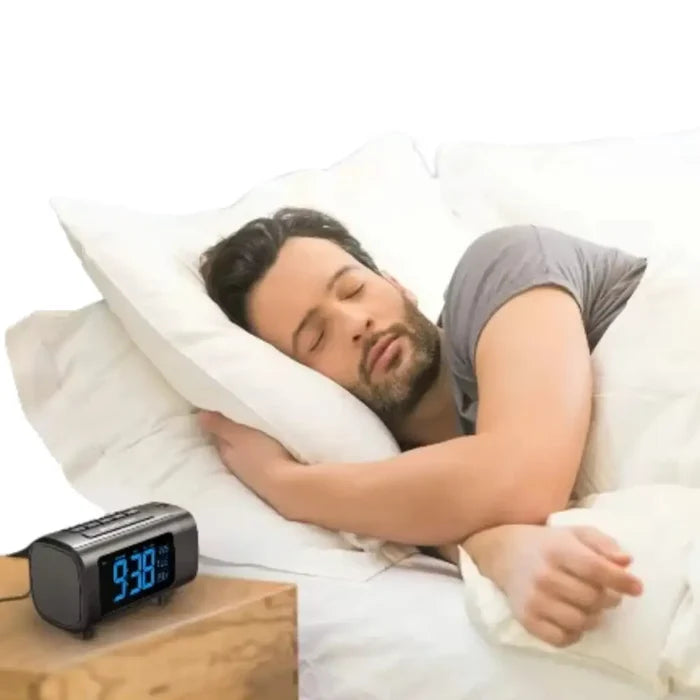 Habicare HBC digital projection alarm clock radio displaying time projection on wall with illuminated display