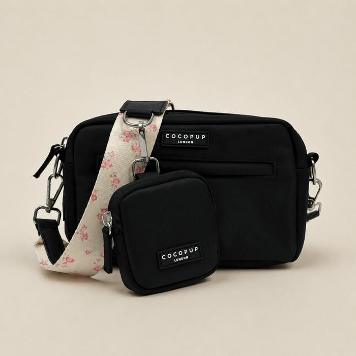 Black Cocopup Dog Walking Bag with floral strap.