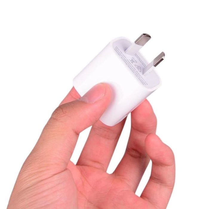 Dual USB power adapter wall plug for NZ and AUS outlets, compact charger with two USB ports for convenient device charging.