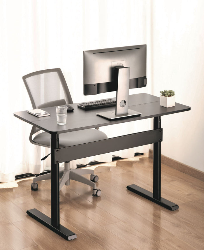 Sue-e Furniture Ergomax gas spring sit-stand computer desk in a modern workspace with adjustable height and clean design.