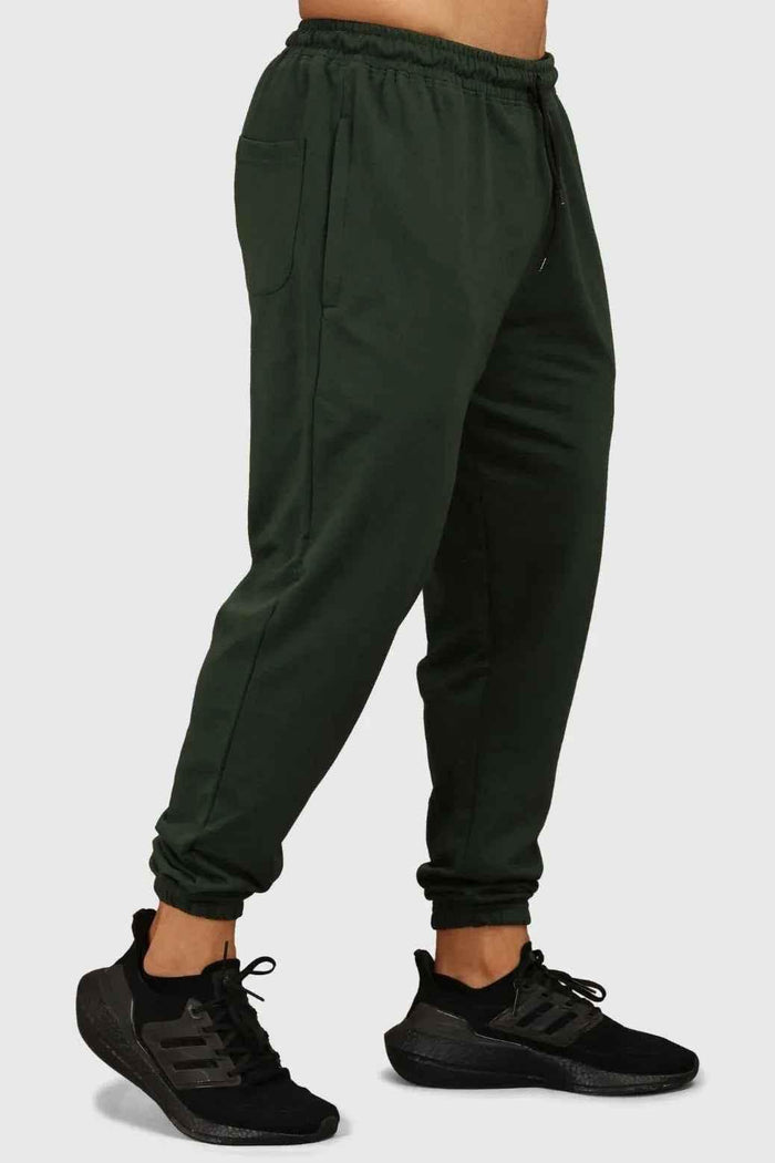 Green fall joggers by Fuaark Nz with a comfortable regular fit, ideal for autumn casual wear.