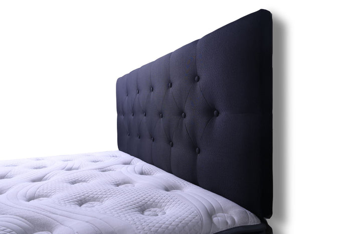 Black queen-sized Fenland headboard by sue-e furniture, featuring a sleek, modern design with a smooth finish.