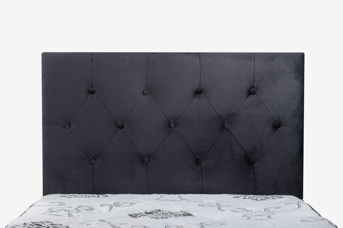 Black velvet Fenland headboard for single beds by sue-e furniture, showcasing a sleek, modern design with soft fabric upholstery.