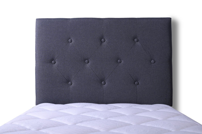 Grey single Fenland headboard by sue-e furniture, showcasing a modern upholstered design with a padded surface and clean lines.