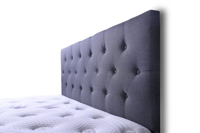 Light grey Fenland king size headboard by sue-e furniture, showcasing smooth upholstered fabric with a modern, stylish design.